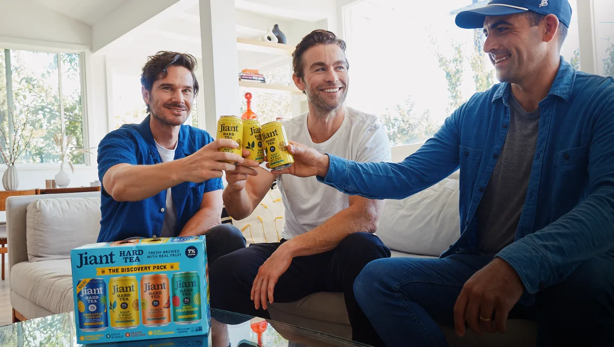 Jiant founders toasting with cans